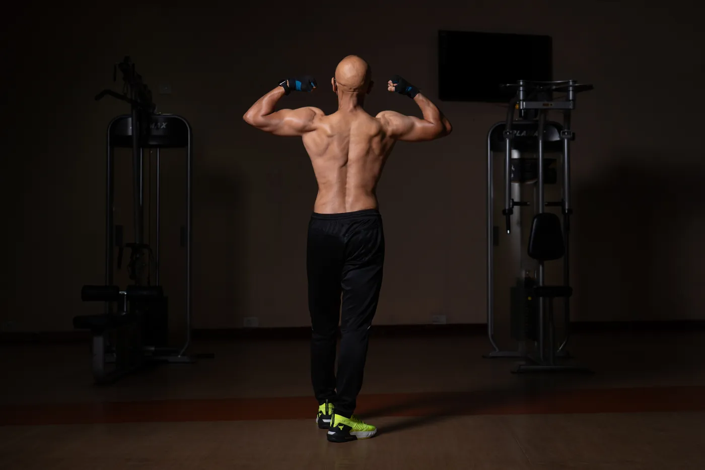 Ajay showing a back double-biceps pose