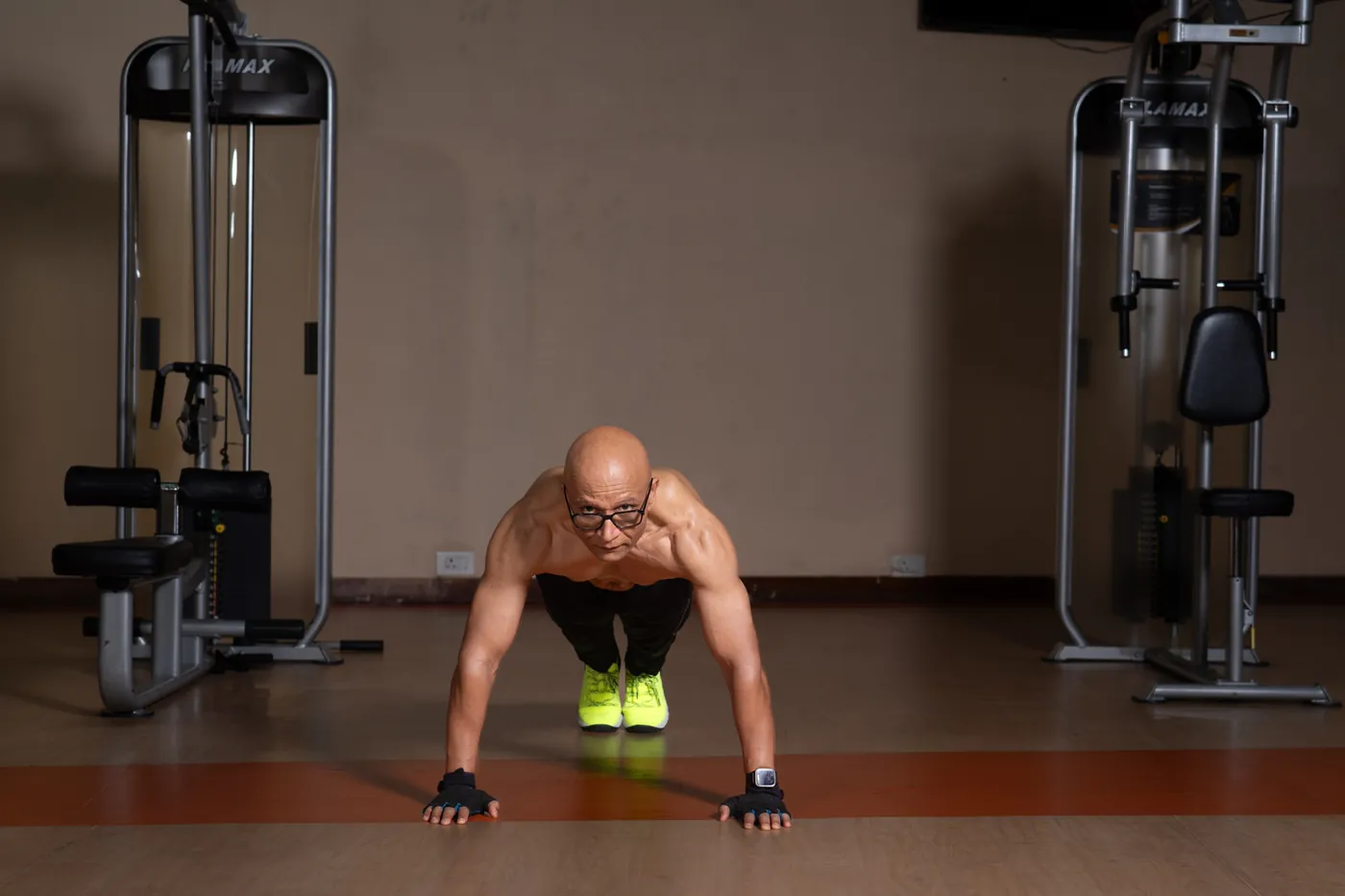 Ajay holding a push-up position
